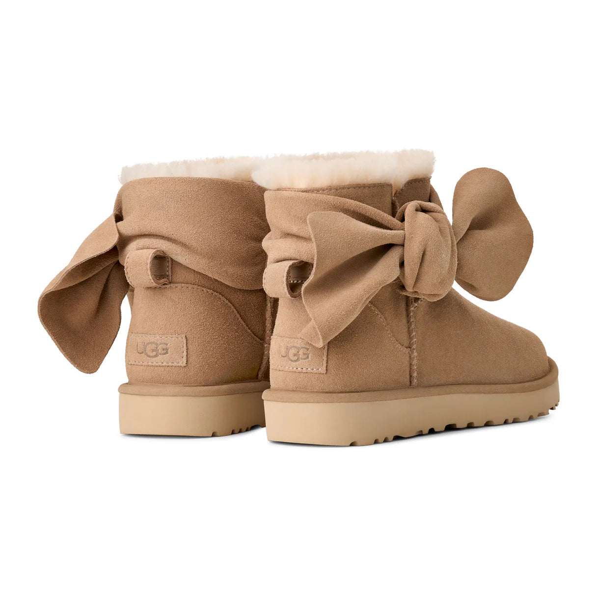 UGG® Classic Mini Bow (Women) - Sand