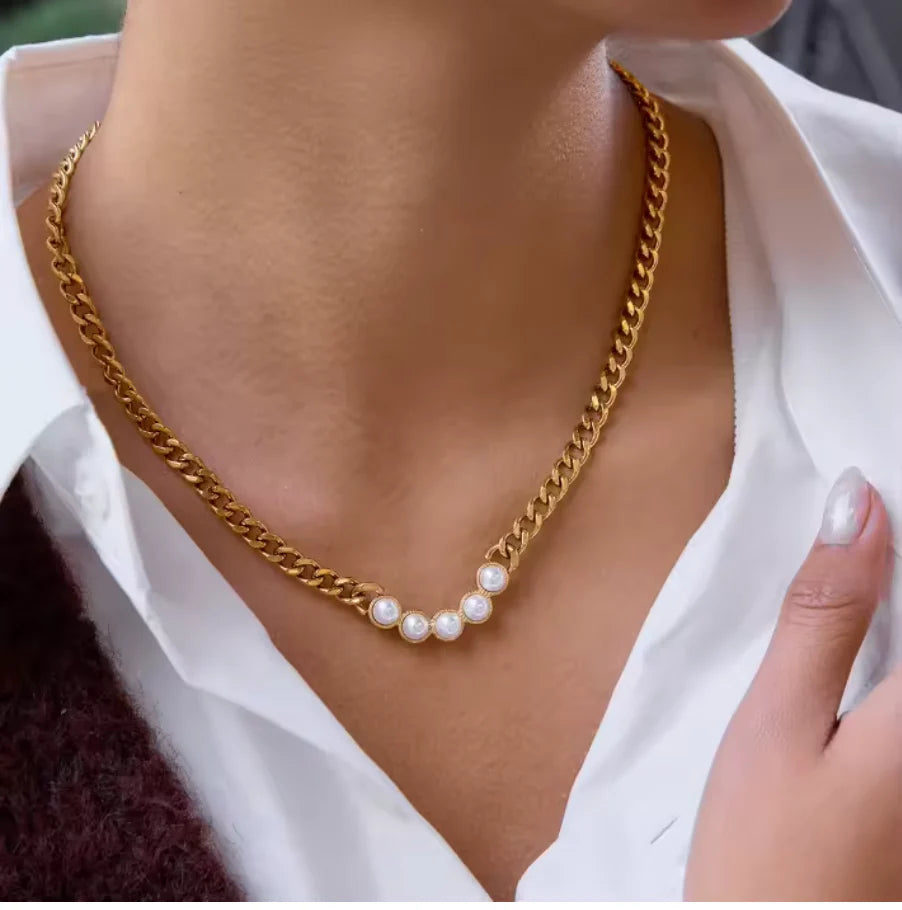 Pearl pendant mount on gold chain