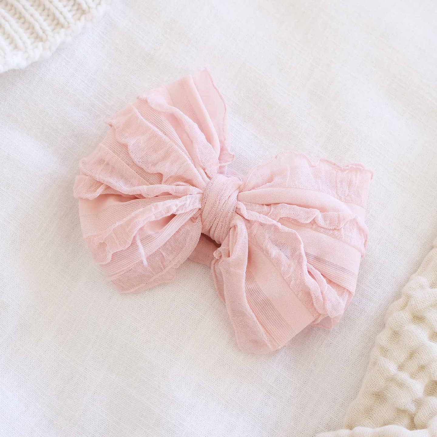 Lotus Ruffle Knit Bow