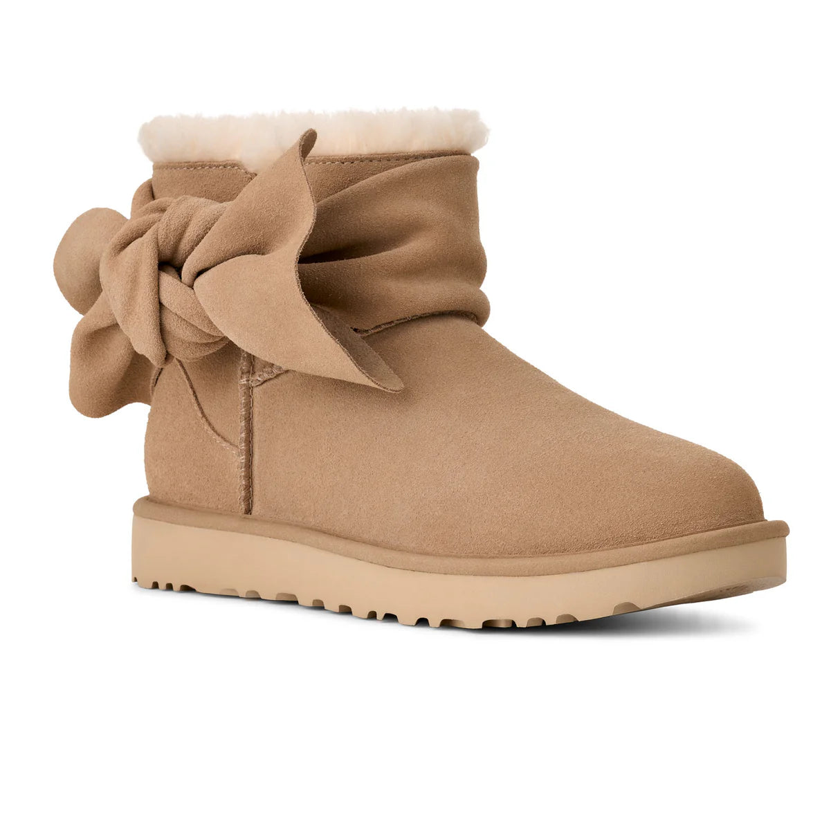 UGG® Classic Mini Bow (Women) - Sand