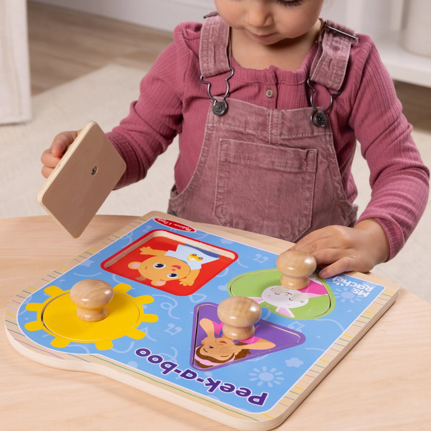 Ms. Rachel™ Wooden Peek-a-Boo Jumbo Peg Puzzle