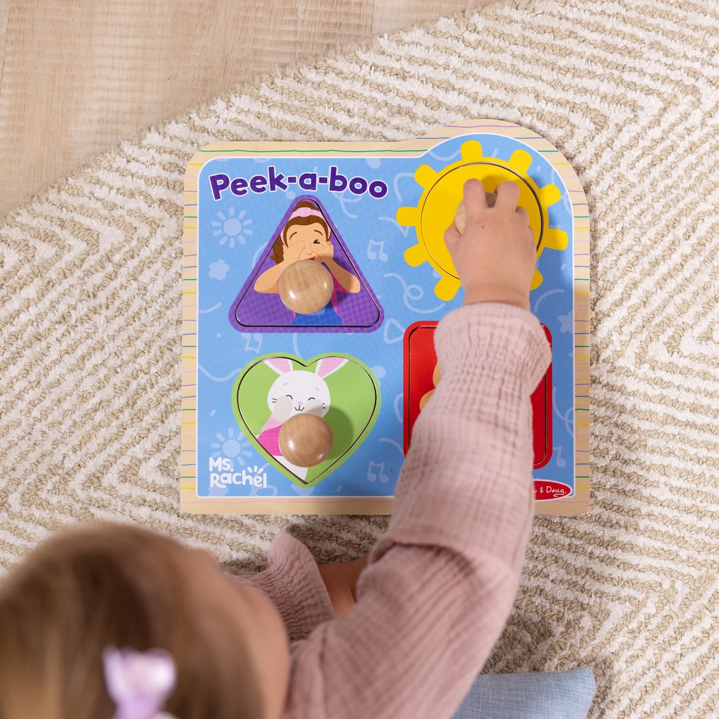 Ms. Rachel™ Wooden Peek-a-Boo Jumbo Peg Puzzle