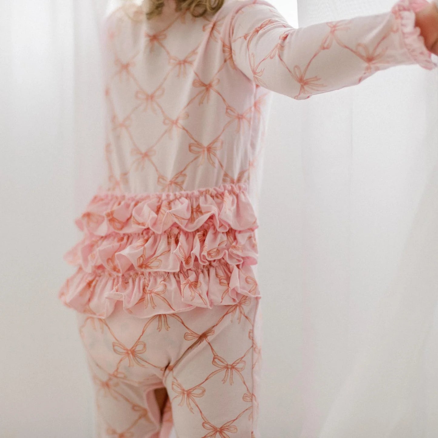 Oh La La Ruffle Romper in Shrinking Violet Bow Lattice