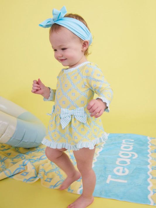 Banana Coastal Charm Long Sleeve One Piece Bow Peplum Rash Guard Swimsuit, With Signature Rear Ruffles