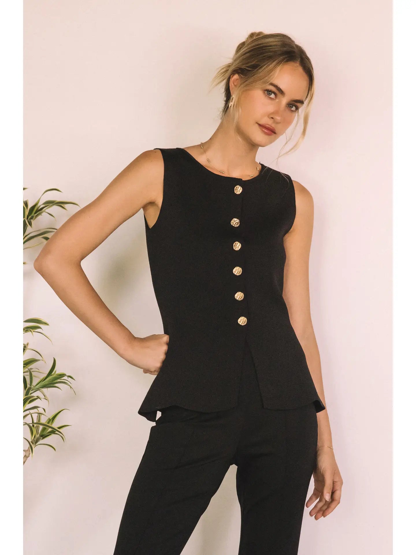 Black Sleeveless Sweater Knit Peplum Top