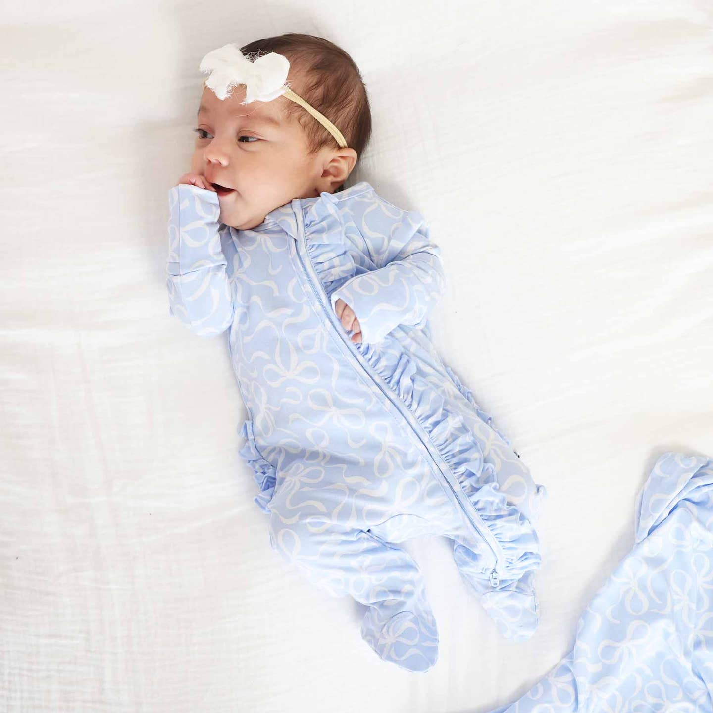 Blue-Tiful Bows Ruffle Zip Footie